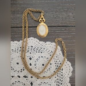 Vintage MONET gold tone mother of pearl pendant long necklace